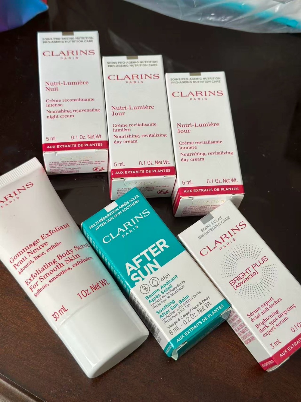 Clarins skincare set — White and Teal packaging
